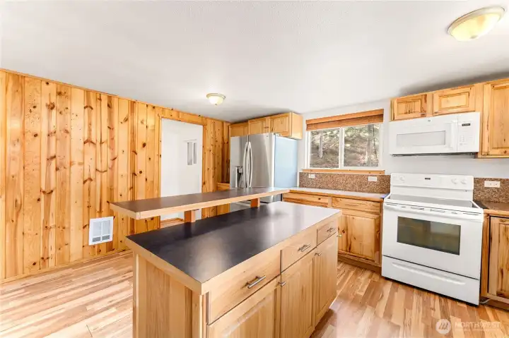 Upper Level Kitchen - View towards stairs to Lower Level.