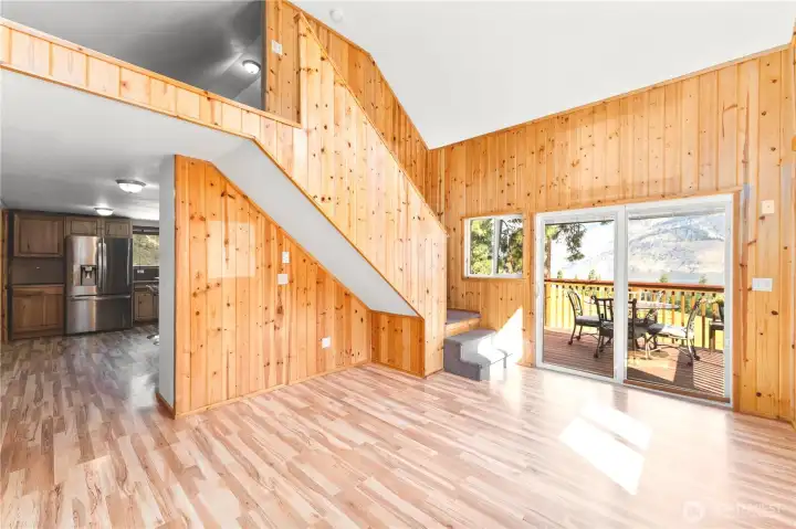 Upper Level Living Room w/ stairs to Upper Level Bonus Loft Area.