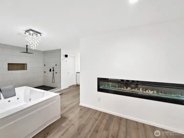 En-suite bath with electric fireplace!