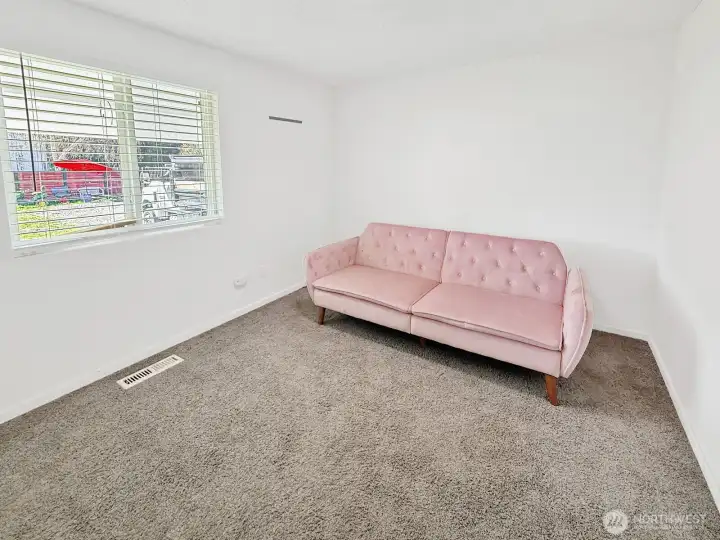 Bonus room #5 on the main level - perfect for having a room on the same level as the kitchen & 3/4 bath.