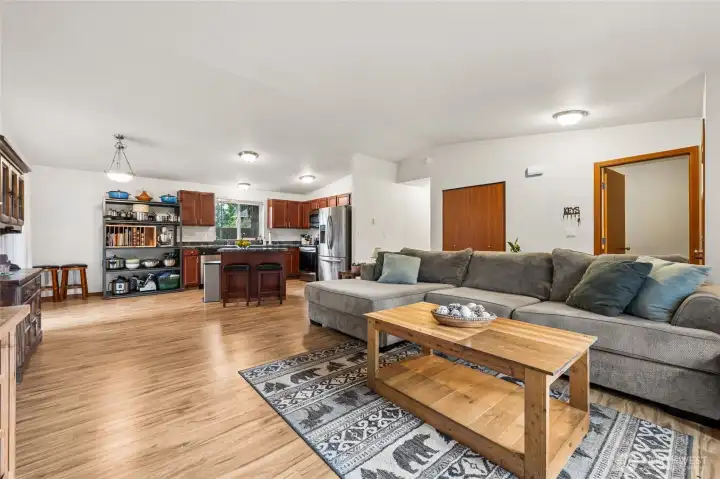 The open-concept layout creates seamless flow between living, dining, and kitchen spaces. It’s designed for a lifestyle that values connection, flexibility, and effortless entertaining.