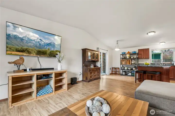 The main living area is finished with LVP, offering the beauty of hardwood with the durability of modern materials. It supports a low-maintenance lifestyle, making it easy to keep the space looking fresh, clean, and inviting year-round.