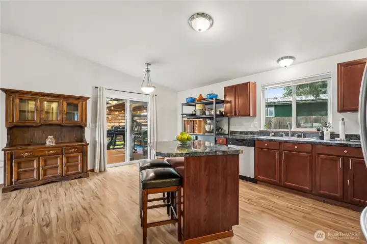 The dining area sits conveniently between the kitchen and slider to the large Trex deck and fully fenced backyard. It’s a comfortable space for everyday meals and weekend entertaining alike. A reverse Osmosis filter on the kitchen water supply gives added purity to the kitchen tap water. Filtration system stays with the home.