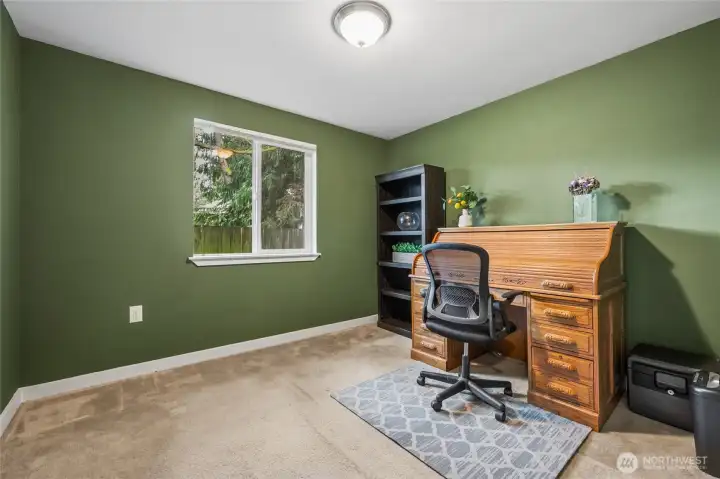 This attractive secondary bedroom is perfect for guests, hobbies, or a home office. Its versatility supports a lifestyle that adapts to your needs.