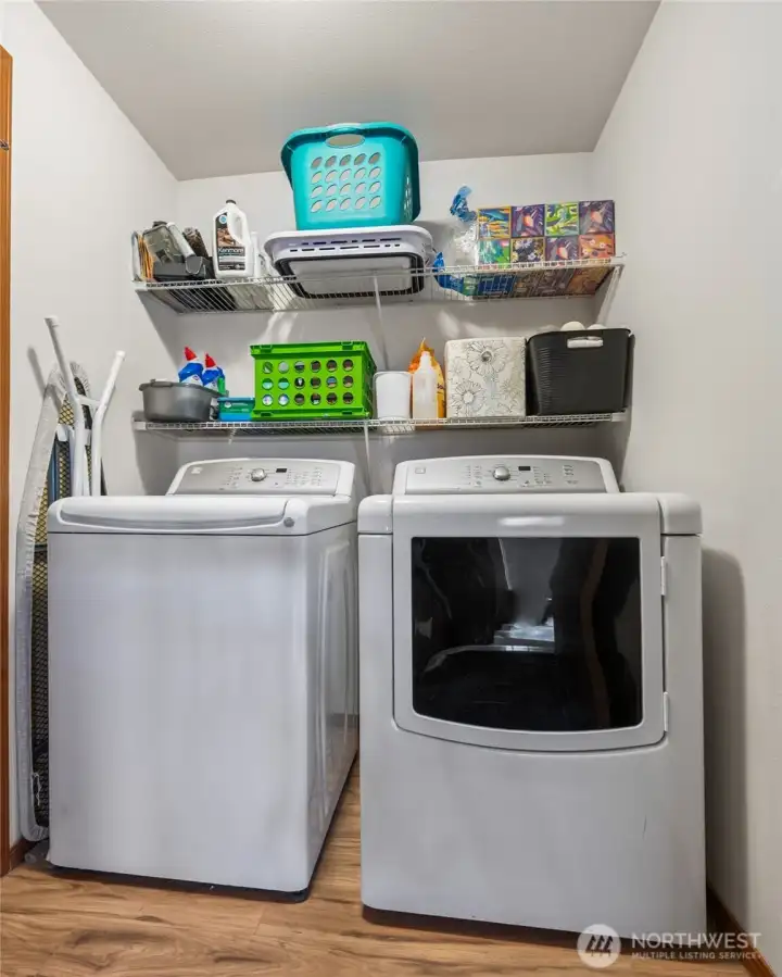 A dedicated laundry space keeps daily tasks organized and efficient. It supports a lifestyle that values practicality and ease. Located directly off of the garage it's a convenient place to drop dirty or muddy clothes and not track them into the house.