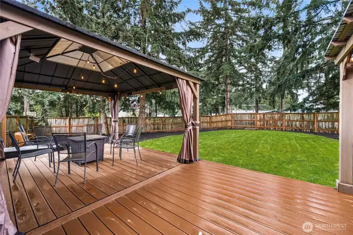 The entertainment-sized Trex deck is perfect for gatherings, grilling, or quiet evenings outdoors. Its low-maintenance design supports a lifestyle focused on enjoyment rather than upkeep. The covered gazebo creates a cozy outdoor living area you can enjoy in any season. It’s ideal for morning coffee, evening conversations, or weekend hosting.