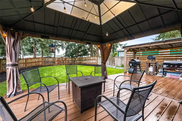 The fully fenced backyard offers privacy and room to relax, play, or entertain. It’s a peaceful outdoor retreat designed for year-round enjoyment. The gazebo and covered Grilling area add to the function and enjoyment of summer gatherings and barbques.