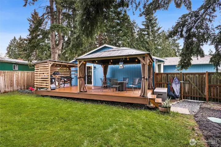 Large 13' x 27' Trex Deck with Gazebo and Covered Bar-b-que area. The fully fenced back yard offers privacy and practicality.