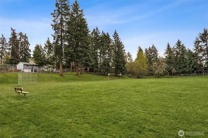 Let's play ball! Rhododendron Park is Just minutes from Hwy 410, shopping, dining, and schools, this location keeps everything within easy reach. It supports a lifestyle centered around convenience and accessibility.