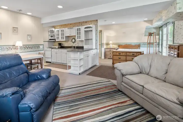 Daylight Basement with Kitchen, Fireplace, Bathroom and Laundry.