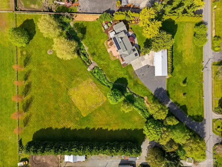Aerial view...the home is set back off the road and secluded with vegetation for privacy.