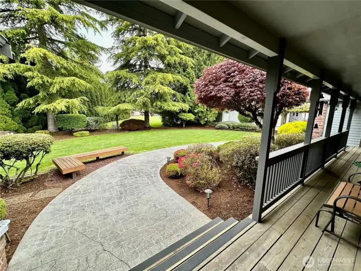 Pathway leading to the front covered porch and formal entry.
