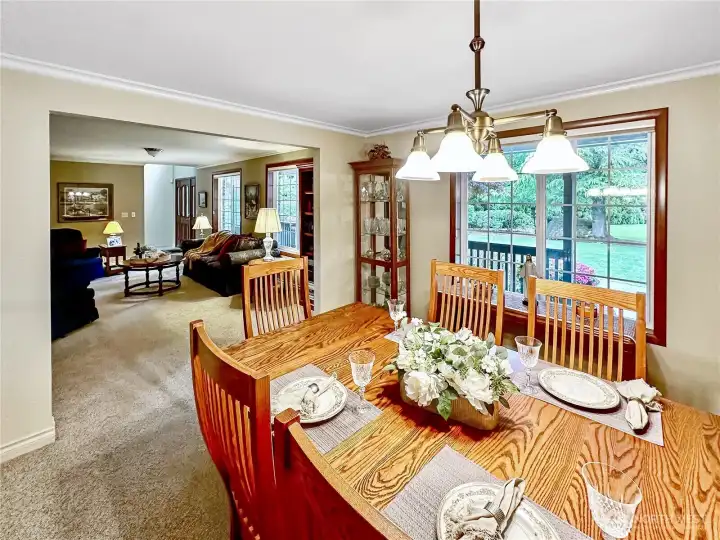 Formal rooms ...love all the big windows with views of the front yard and covered porch.