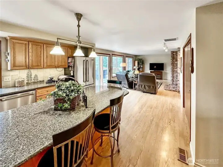 The center island/eating bar offers great counter space for meal preps and buffet style entertaining.