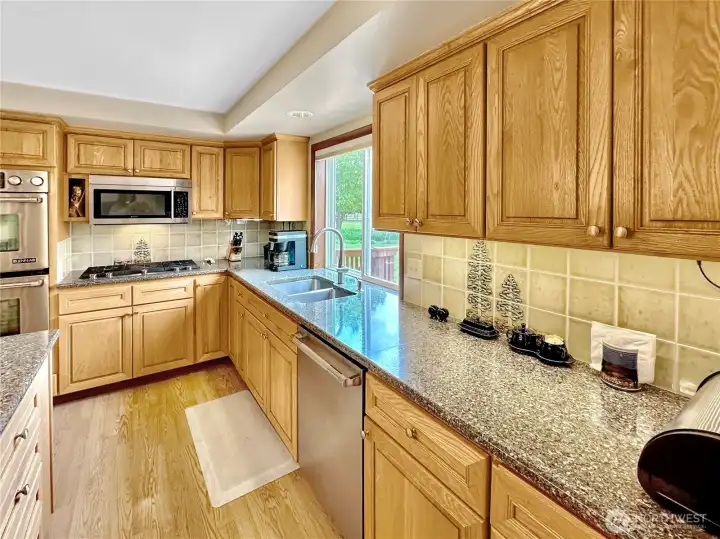 Another kitchen view...in this photo you see the full tile back splash and beautiful cabinets.