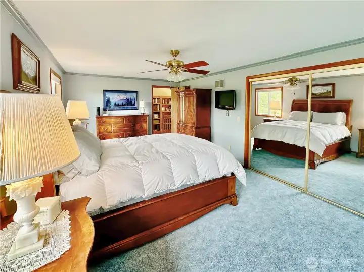 Private Primary Bedroom with territorial views of the the acreage and 5 piece bath.
