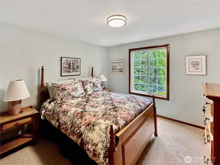 Main floor 2nd bedroom conventionally located next to the full bath.