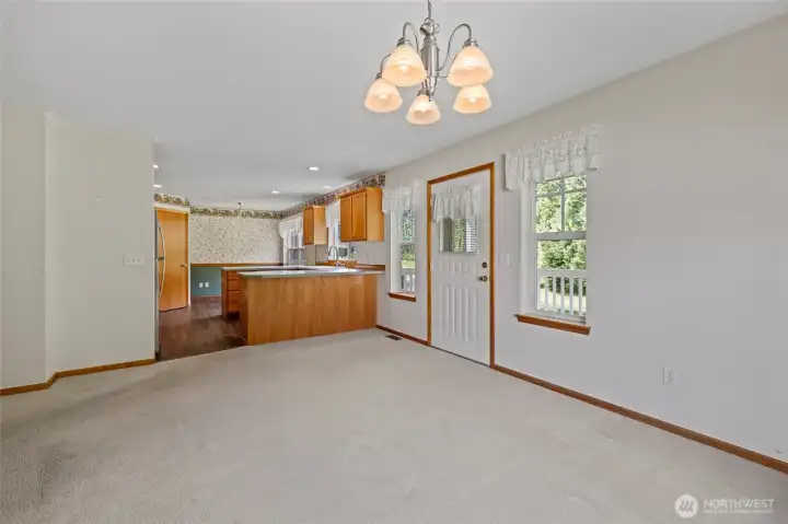 Kitchen just off the dining area - entry to covered back deck