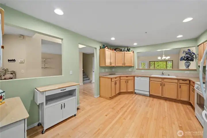 The kitchen is open, to all the other rooms, and spacious enough for a breakfast nook The kitchen is open, to all the other rooms, and spacious enough for a breakfast nook