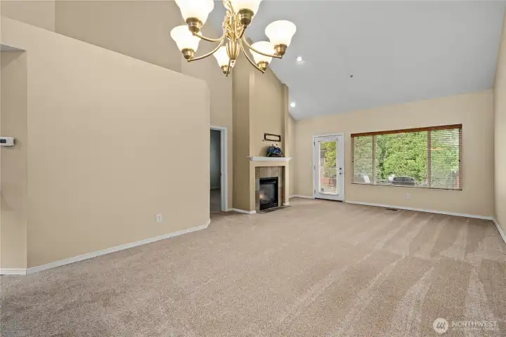 This oversized dining and living room area leads out to the backyard This oversized dining and living room area leads out to the backyard