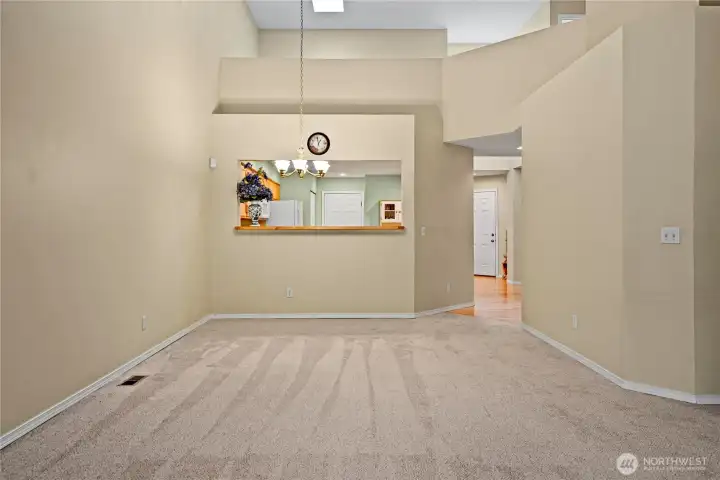The dining room and kitchen are connected by a convenient open bar. The dining room and kitchen are connected by a convenient open bar.