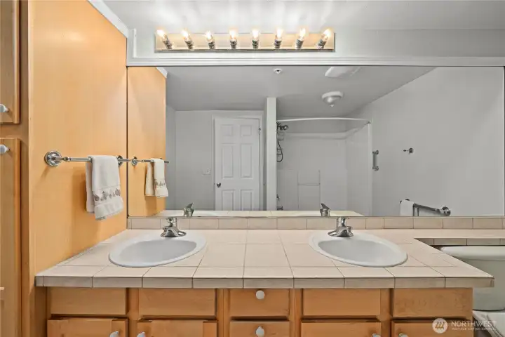 Room for 2 in the primary bath suite. Room for 2 in the primary bath suite.