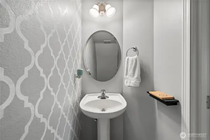 There's also a charming main floor powder room There's also a charming main floor powder room