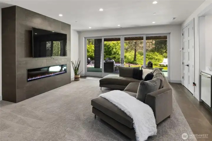 downstaris bonus room with fireplace, wet bar with beverage fridge, dishwasher downstaris bonus room with fireplace, wet bar with beverage fridge, dishwasher