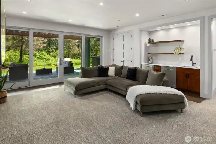 downstaris bonus room with fireplace, wet bar with beverage fridge, dishwasher downstaris bonus room with fireplace, wet bar with beverage fridge, dishwasher