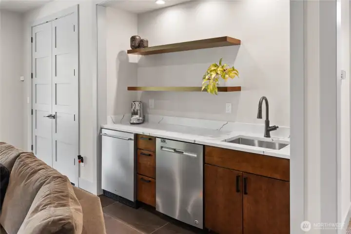 downstaris bonus room with fireplace, wet bar with beverage fridge, dishwasher downstaris bonus room with fireplace, wet bar with beverage fridge, dishwasher