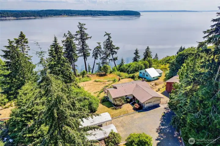 There are two carports that will cover cars, boats or RVs