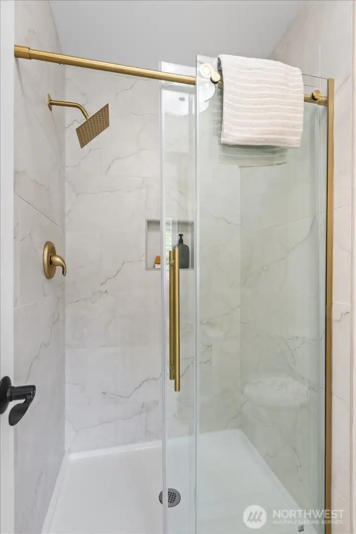 Gorgeous tile shower and private toilet room