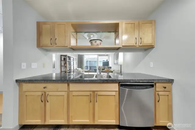 Natural light floods the living room from the large balcony doors!