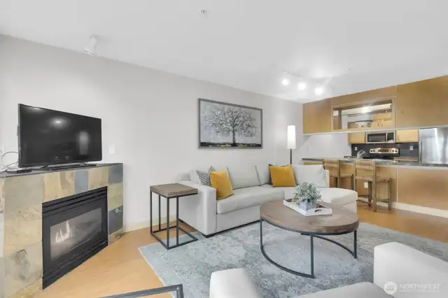 Cozy up by the gas fireplace while enjoying stunning city views.