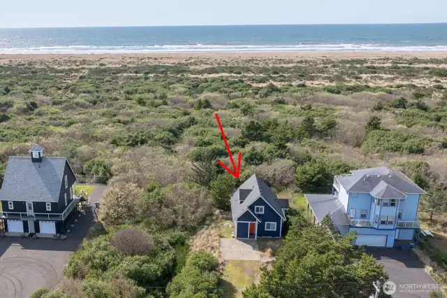 Serenity is calling with this darling Ocean and Dune Front Home.