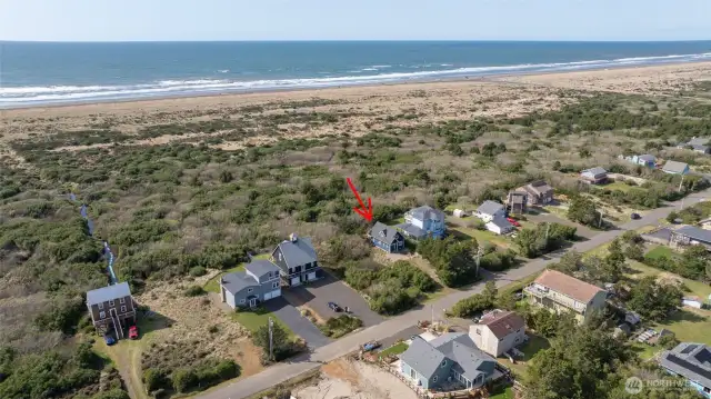 Located on Sand Dune Ave SW with the Dunes Area and the Ocean behind the property.