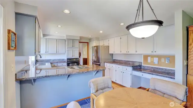 Enjoy formal dining, eating space off the kitchen, or breakfast bar seating - providing space for everyone to gather!