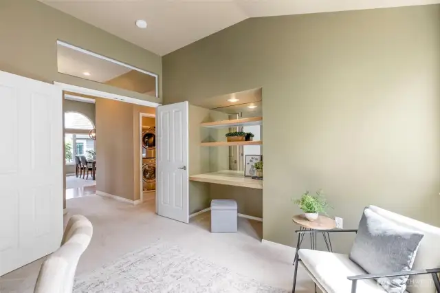 Another view of the office/den, with double-doors opening into the hallway and through to the living area.