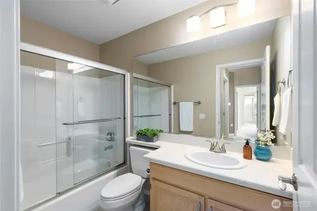 This sparkling full bath is handy to the living area and the guest bedroom.