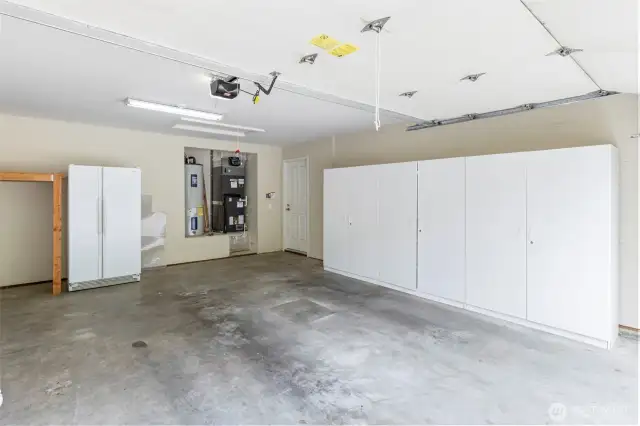 This fully-finished two-car garage has tons of built-in storage!