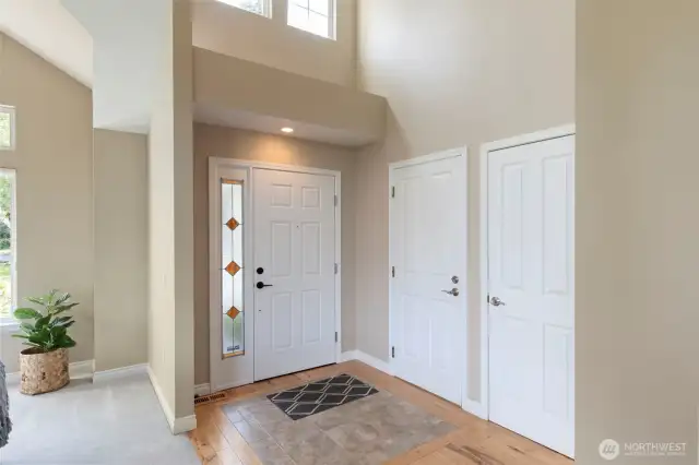 Lofty entry enjoys plenty of natural light.