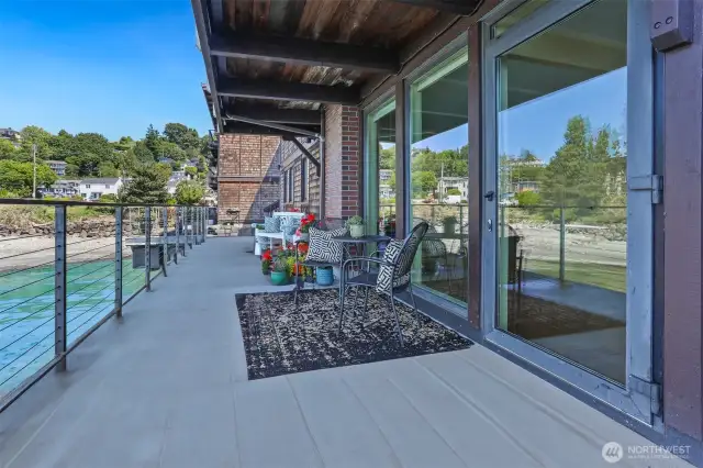 Expansive patio runs the entire length of the unit! Room for dining and relaxing with friends!