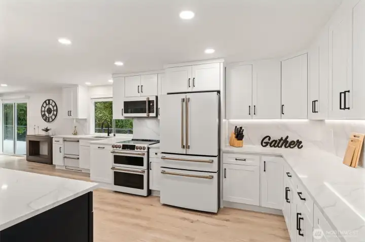 High end appliances & quartz counters.