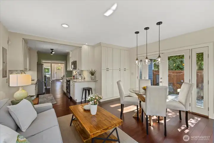 The lovely French doors flow out to the patio and large yard.  On each side of the doors are sidelights that open, so awesome.