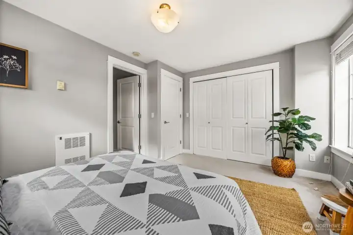 Primary bedroom with ensuite and tons of closet storage.