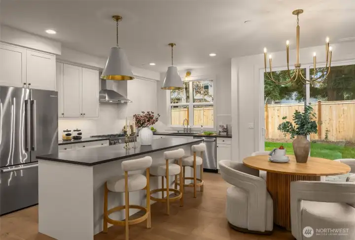 Kitchen featuring a premium stainless steel appliance package. featuring Bertazzoni Italia, Bosch, and Samsung.