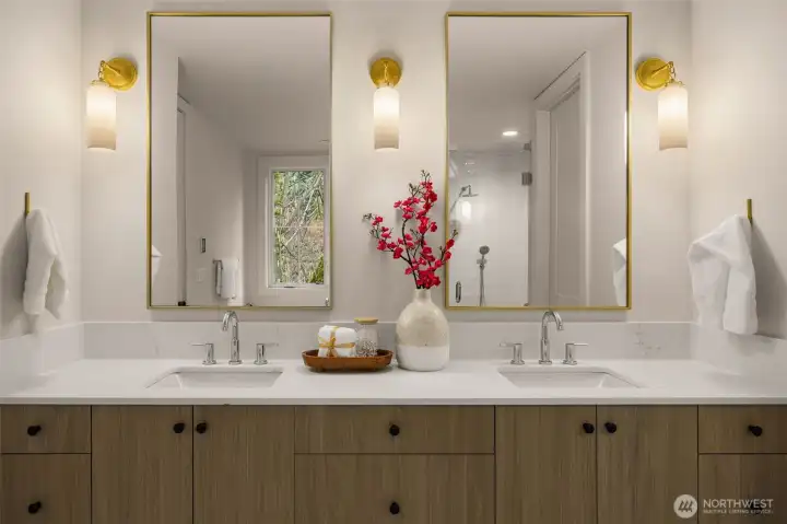 Heated floors + dual sinks.