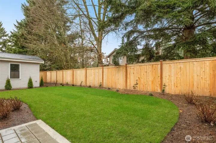 Fully landscaped and fenced rear yard.