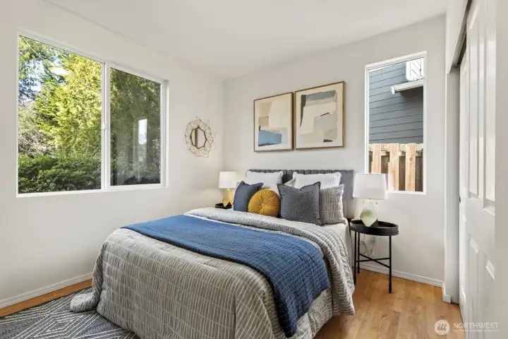 Main-level bedroom with nearby full bath—ideal for guests or flexible use.