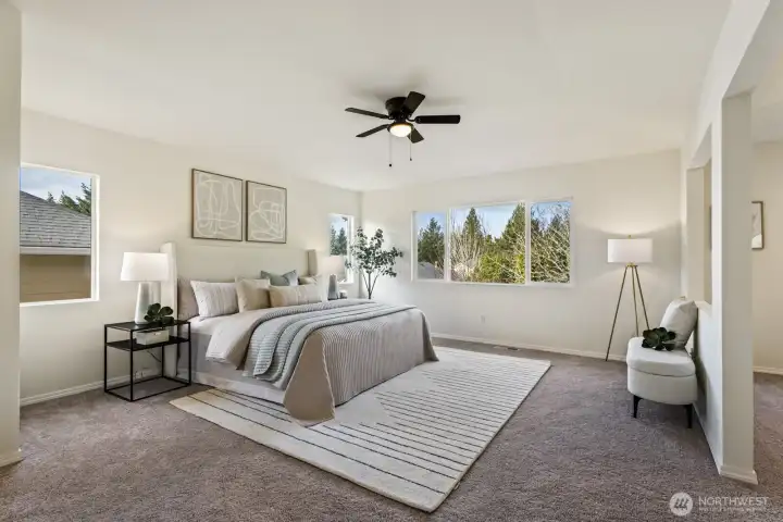 Spacious primary suite offering a peaceful retreat.